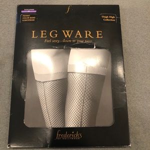 Frederick’s black/purple thigh-high fishnets